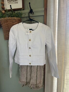 J Crew women’s white cropped jean jacket.